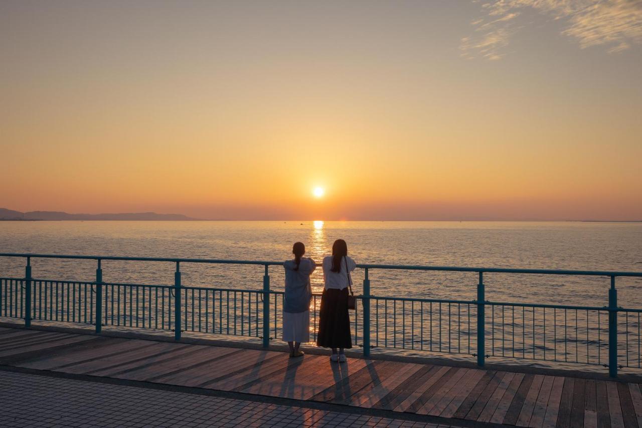 Omo Kansai Airport By Hoshino Resorts Izumi-Szano Kültér fotó Sunset at the promenade